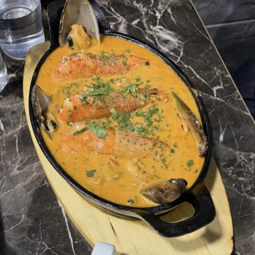 Cazuela de mariscos, seafood casserole with king prawns and mussels