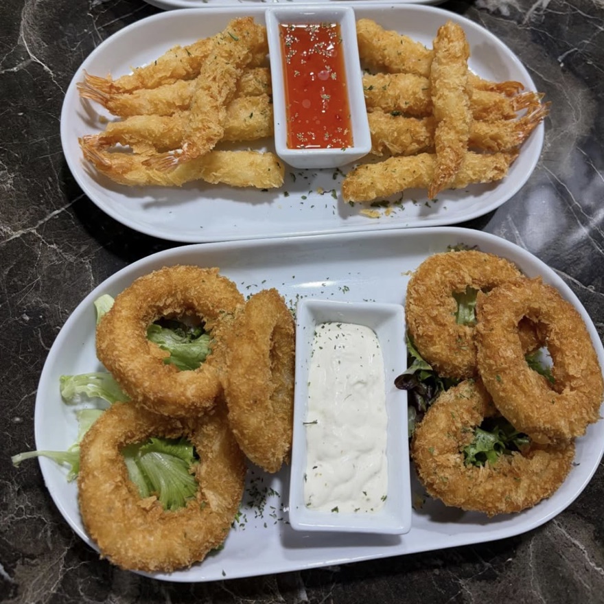 Tempura king prawns with sweet chilli sauce, and calamari with garlic sauce